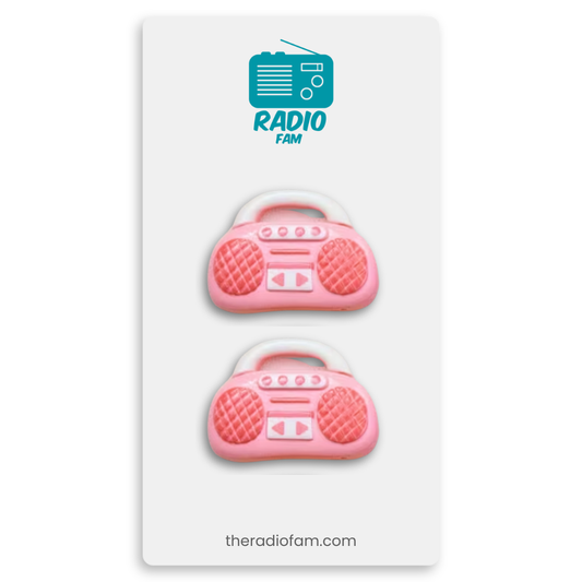 Pink radio-shaped charms on a white card with 'Radio Fam' branding.